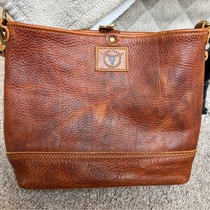 Coastal Hillbilly vacation bucket in old fashioned saddle.